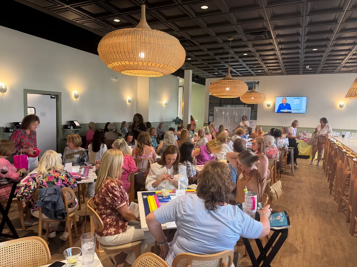 A full dining room at Tee Off at The Wharf, every table taken for a game night