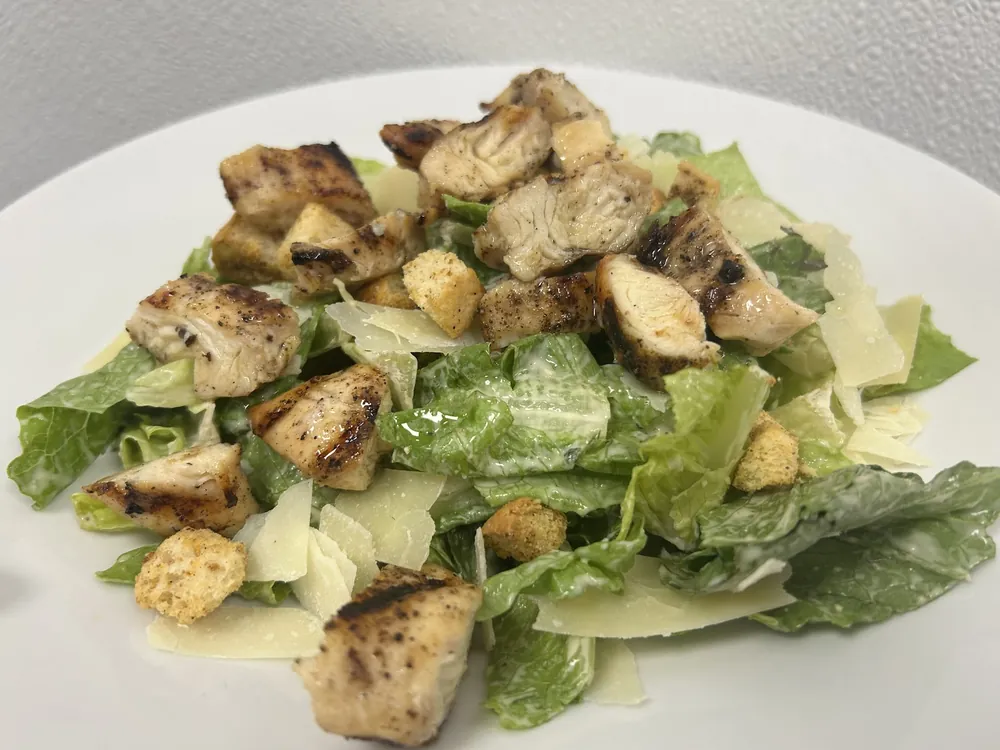 Grilled chicken Caesar salad at Tee Off at The Wharf