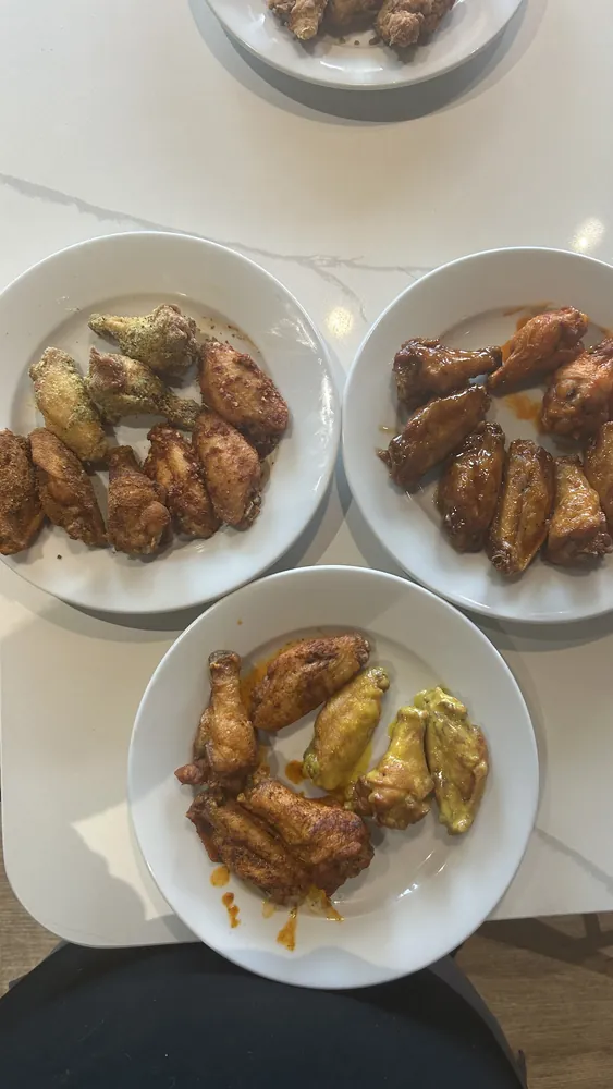 Chicken wings in several sauces at Tee Off at The Wharf